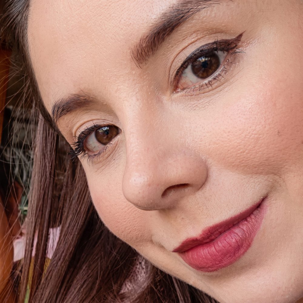 Andrea C., Rinoplastia — paciente feliz de Real·C Clínica